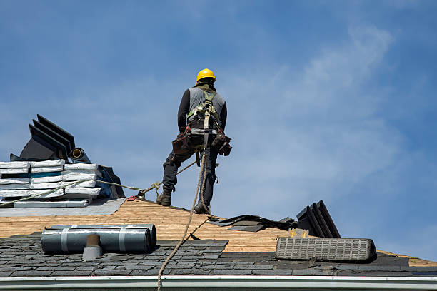 Professional Roofing technician working in Manchester, MD